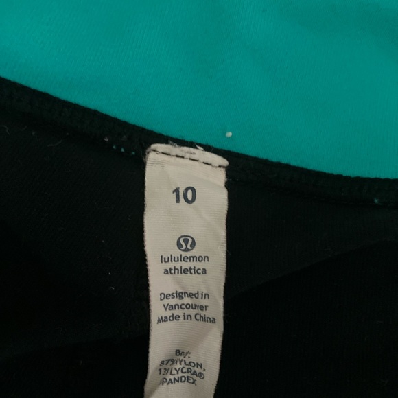 Lululemon Leggings Drawstring Hem Sz 10. Turquoise wide waist w/ black leggings. - Picture 3 of 5